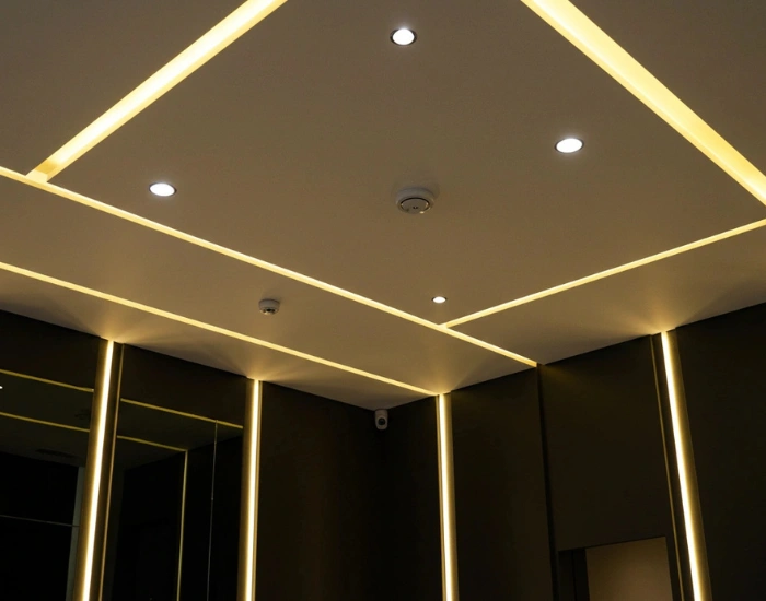 Ceiling with recessed lighting and modern design features.